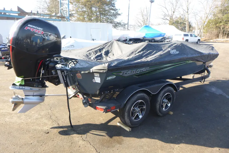 Slide: The Image of 2023 Ranger RT198P boat with Mercury Pro XS engine, covered and on trailer. - 19