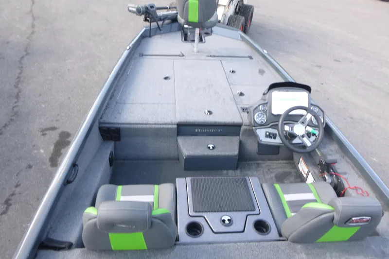 Slide: The Image of 2023 Ranger RT198P fishing boat interior with steering console and seating. - 5