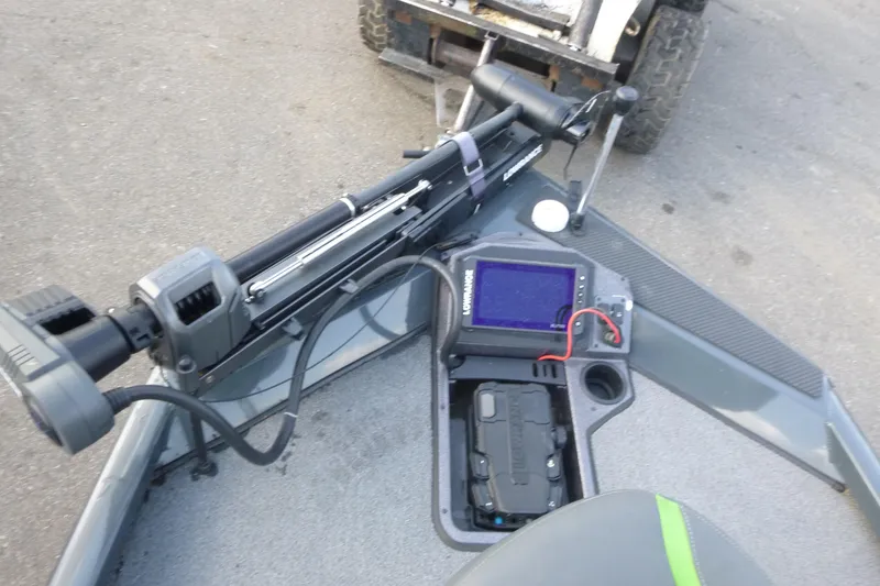 Slide: The Image of 2023 Ranger RT198P boat dashboard with electronic controls and navigation system. - 7