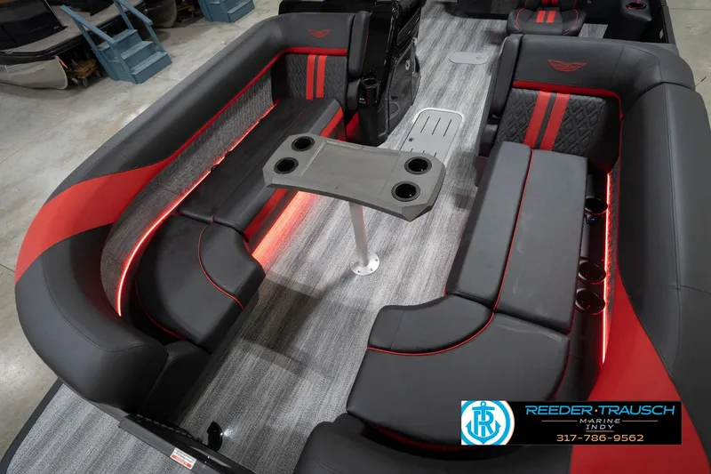 Slide: The Image of Luxurious interior of 2026 Bennington 24 MSB pontoon boat with sleek seating and ambient lighting. - 10