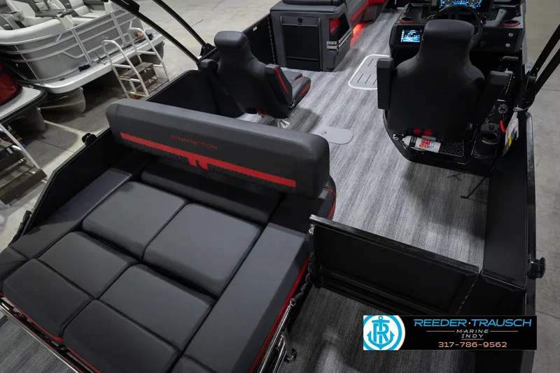 Slide: The Image of 2026 Bennington 24 MSB boat interior with modern seating and control panel. - 12