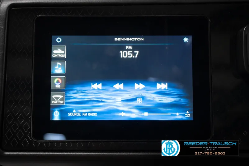 Slide: The Image of Touchscreen display of a 2026 Bennington 24 MSB showing FM radio controls. - 38