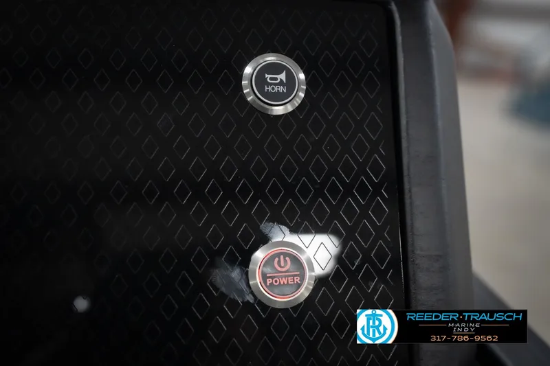 Slide: The Image of 2026 Bennington 24 MSB dashboard with horn and power buttons, Reeder-Trausch Marine logo. - 41