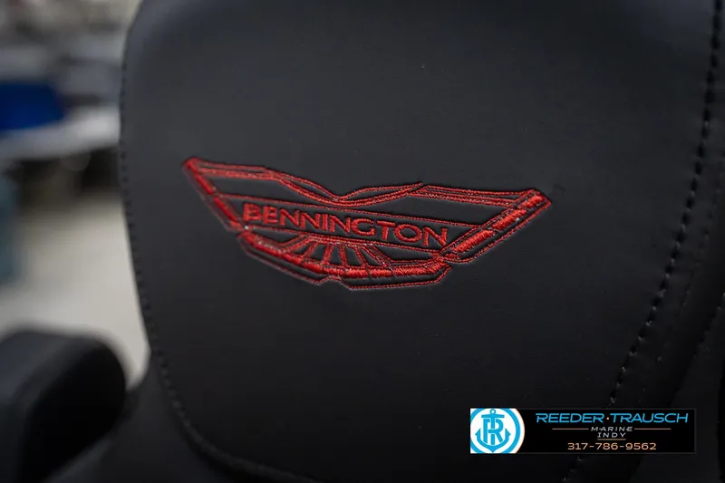 Slide: The Image of Close-up of 2026 Bennington 24 MSB seat with red embroidered logo. - 44