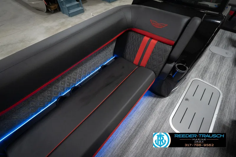Slide: The Image of 2026 Bennington 24 MSB boat interior with stylish seating and ambient lighting. - 46