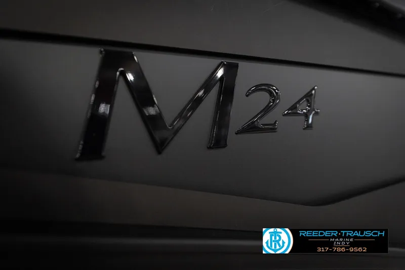 Slide: The Image of 2026 Bennington 24 MSB boat emblem with Reeder Trausch Marine logo. - 54