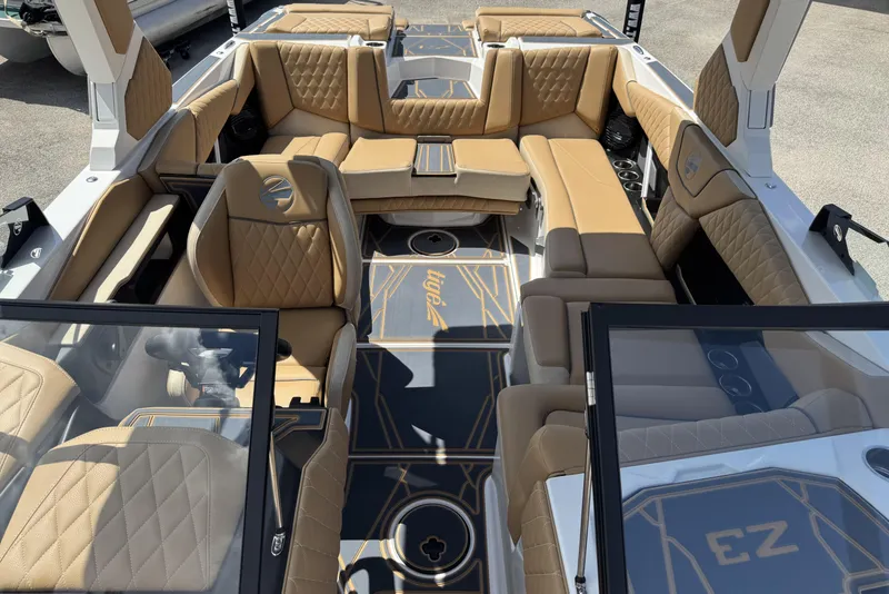 Slide: The Image of 2026 Tigé Z3 boat interior with tan leather seating and modern design. - 13