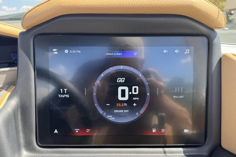 Slide: The Image of 2026 Tigé Z3 dashboard display showing speedometer and control settings. - 17