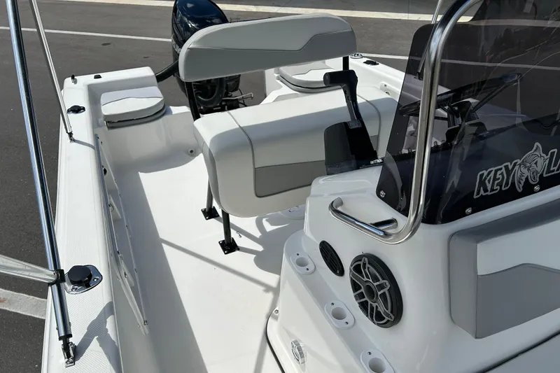 Slide: The Image of 2022 Key Largo 1800 Center Console boat interior with seating and console details. - 10