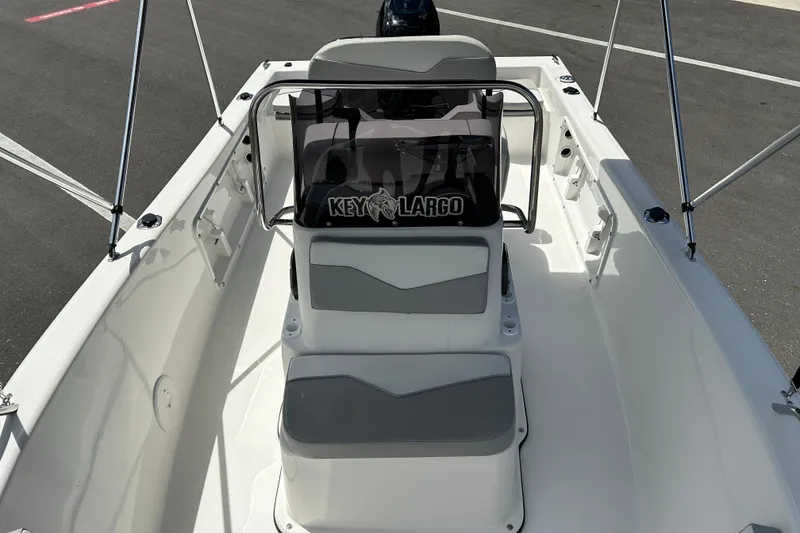 Slide: The Image of 2022 Key Largo 1800 Center Console boat interior with seating and console view. - 9