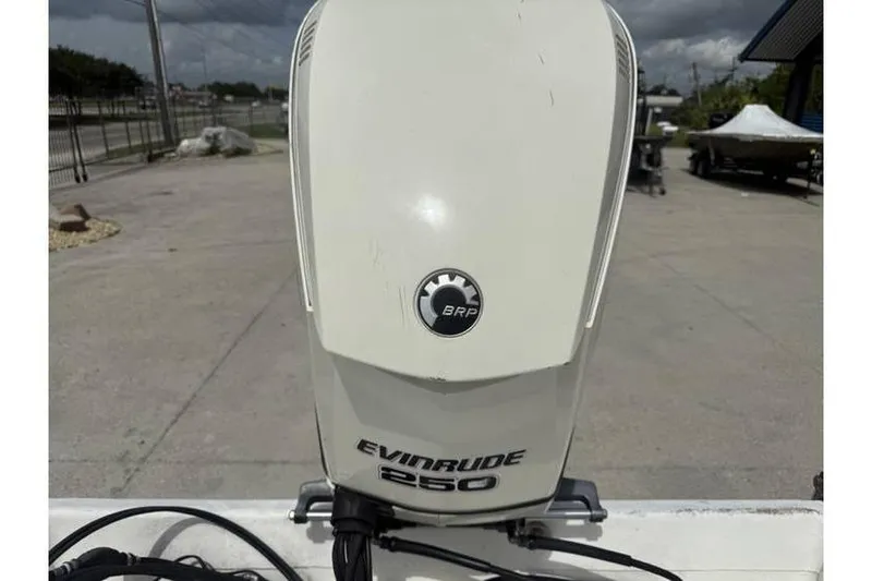 Slide: The Image of Evinrude 250 outboard motor on 2008 Sea Chaser 2400 CC boat. - 11