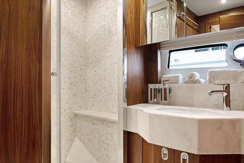 Slide: The Image of Luxurious bathroom in 2016 Sunseeker 75 Yacht with marble sink and modern fixtures. - 12