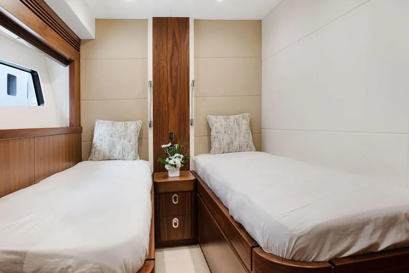 Slide: The Image of Luxurious twin cabin interior of 2016 Sunseeker 75 Yacht with elegant wood finishes. - 13