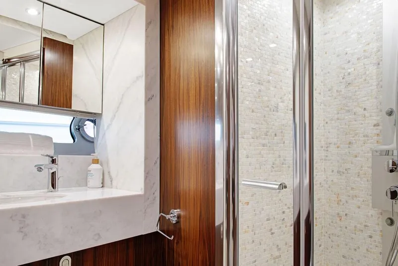 Slide: The Image of Luxurious bathroom in 2016 Sunseeker 75 Yacht with marble sink and modern shower. - 14