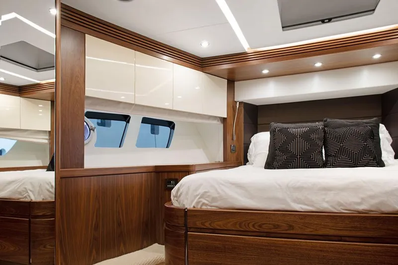 Slide: The Image of Luxurious bedroom interior of 2016 Sunseeker 75 Yacht with elegant wood finish and modern design. - 16