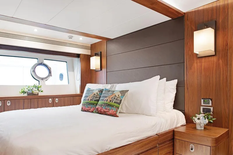 Slide: The Image of Luxurious bedroom interior of 2016 Sunseeker 75 Yacht with elegant wood finishes. - 18