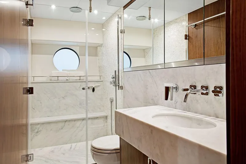 Slide: The Image of Luxurious bathroom in 2016 Sunseeker 75 Yacht, featuring marble finishes and modern fixtures. - 22