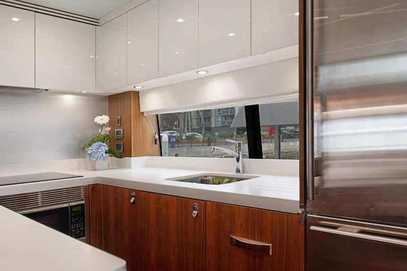 Slide: The Image of Luxurious kitchen interior of 2016 Sunseeker 75 Yacht with modern appliances and sleek design. - 25