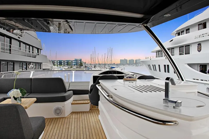 Slide: The Image of Luxurious 2016 Sunseeker 75 Yacht interior with marina view at sunset. - 34