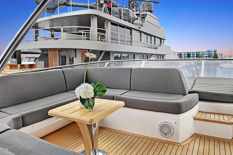 Slide: The Image of Luxurious Sunseeker 75 Yacht 2016 with elegant deck seating and scenic marina view. - 35