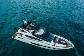 Slide: The Image of 2016 Sunseeker 75 Yacht cruising on open blue waters. - 4