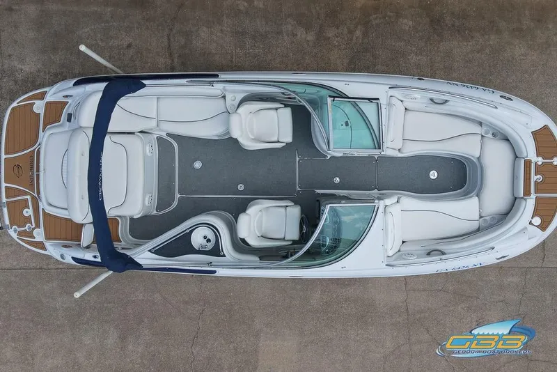 Slide: The Image of Top view of a 2004 Crownline 240 EX boat with spacious seating layout. - 11