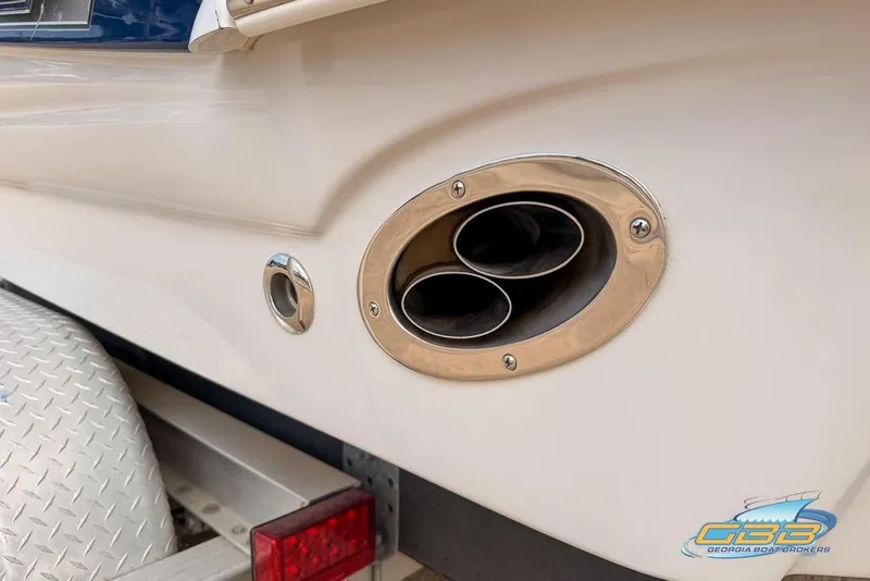 Slide: The Image of Close-up of 2004 Crownline 240 EX boat exhaust and trailer detail. - 5