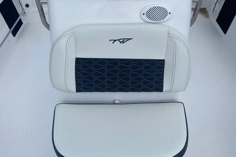 Slide: The Image of 2024 Tidewater 1910 Bay Max boat seat with stylish black and white design. - 3
