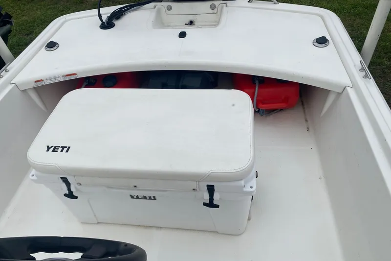 Slide: The Image of 2015 Mako 171 Center Console boat with Yeti cooler on deck. - 3