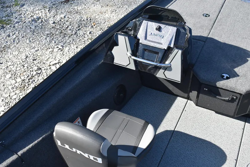Slide: The Image of 2026 Lund 1875 Renegade boat interior with open storage compartments. - 15