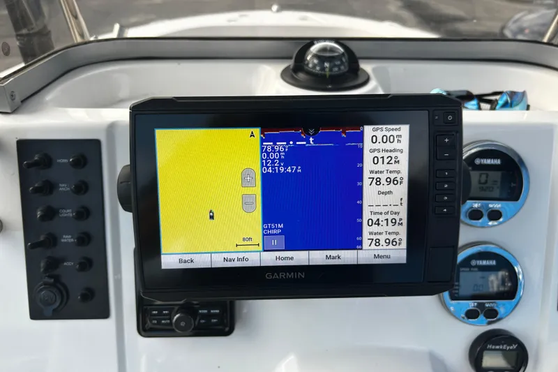 Slide: The Image of Garmin navigation system on 2018 Robalo R180 Center Console boat dashboard. - 14