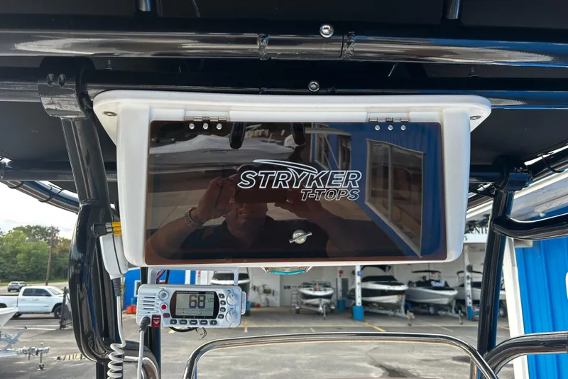 Slide: The Image of 2018 Robalo R180 Center Console with Stryker T-Tops and marine electronics. - 16