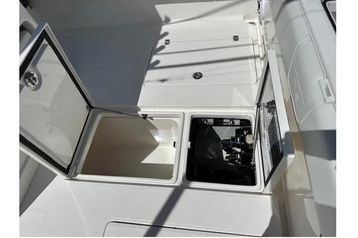 Slide: The Image of 2024 SeaVee 340Z boat deck with open storage compartments. - 10