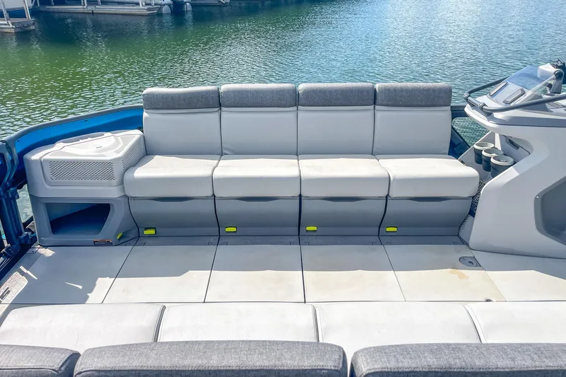 Slide: The Image of 2023 Sea-Doo Switch Cruise 21 boat interior with spacious seating and modern design. - 13