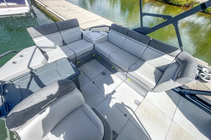 Slide: The Image of 2023 Sea-Doo Switch Cruise 21 interior with spacious seating and modern design. - 19