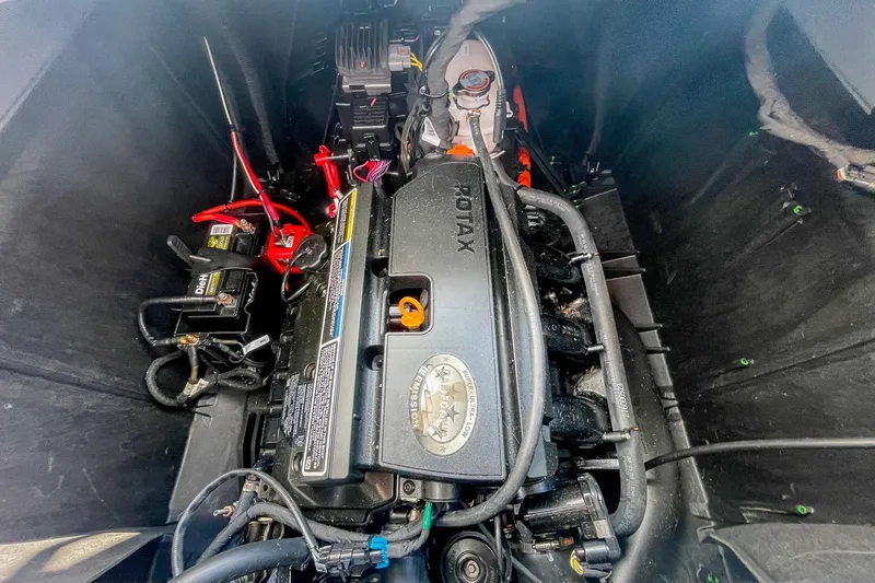 Slide: The Image of 2023 Sea-Doo Switch Cruise 21 engine compartment showcasing Rotax engine components. - 21
