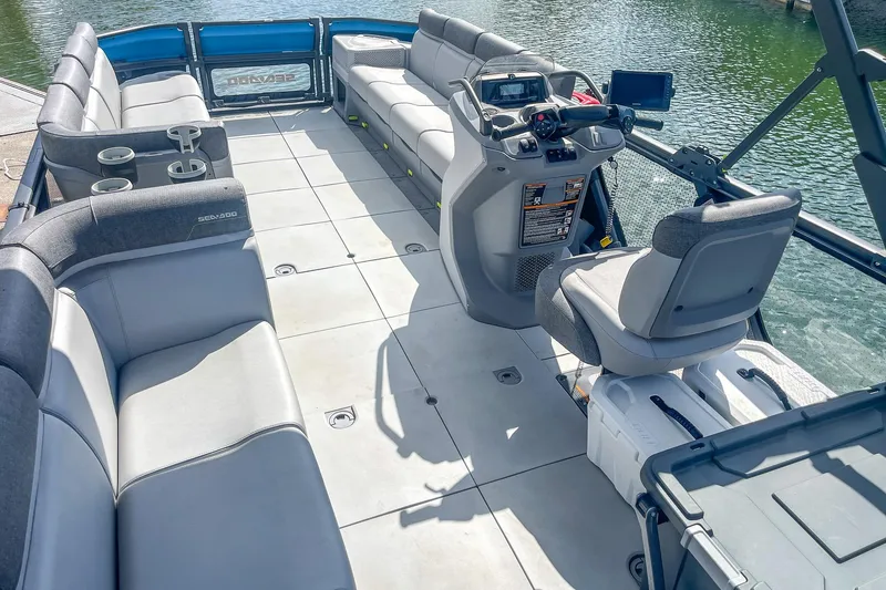 Slide: The Image of 2023 Sea-Doo Switch Cruise 21 interior with spacious seating and modern controls. - 4