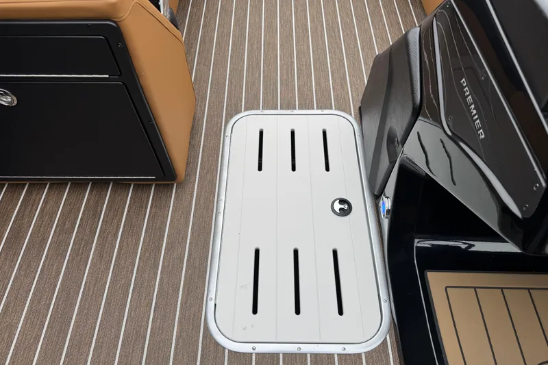 Slide: The Image of Interior view of 2026 Premier 230 Solaris RL boat with sleek flooring and seating. - 12