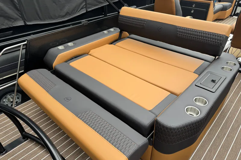 Slide: The Image of Luxurious seating on 2026 Premier 230 Solaris RL boat with cup holders and sleek design. - 29