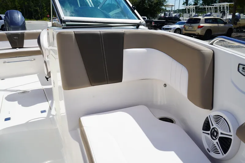 Slide: The Image of 2020 Chaparral 23 SSi OB boat interior with cushioned seating and speaker. - 35
