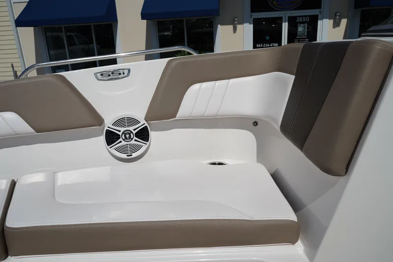 Slide: The Image of 2020 Chaparral 23 SSi OB boat interior with cushioned seating and speaker. - 36