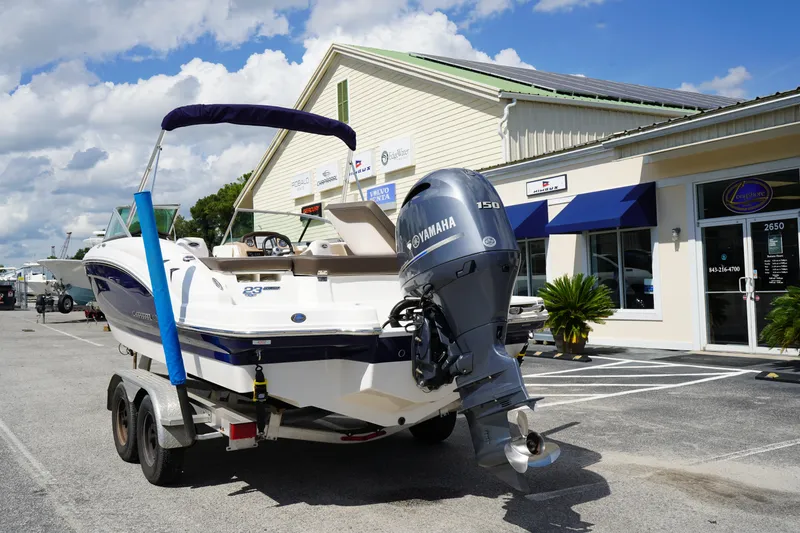 Slide: The Image of 2020 Chaparral 23 SSi OB boat with Yamaha engine on trailer outside dealership. - 4