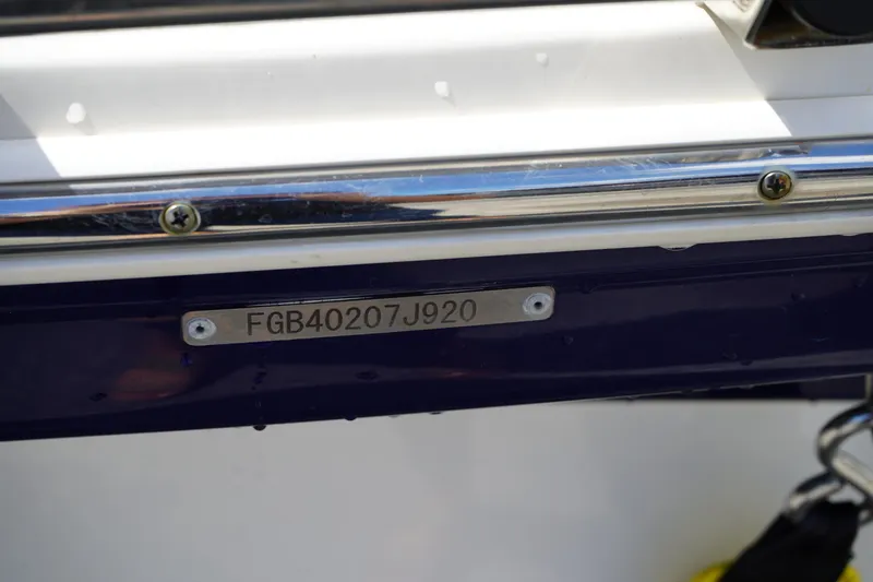 Slide: The Image of 2020 Chaparral 23 SSi OB boat with visible hull identification number. - 43