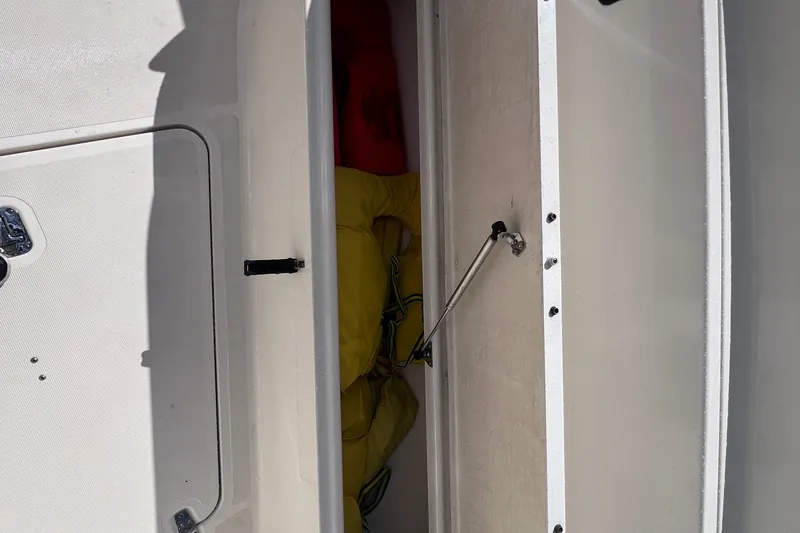 Slide: The Image of 2007 Pursuit C 300 Center Console with twin Yamaha 250 engines and American flag. - 13