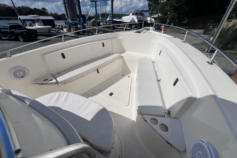 Slide: The Image of 2007 Pursuit C 300 Center Console boat interior with bridge in background. - 15