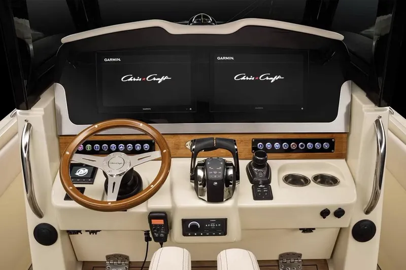 Slide: The Image of Manufacturer Provided Image: 2025 Chris-Craft Catalina 30 helm with modern controls and dual displays. - 10
