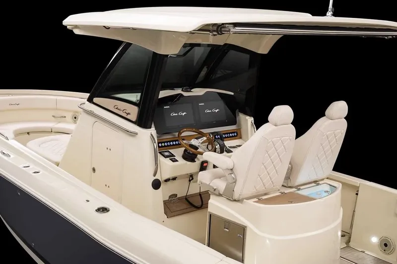 Slide: The Image of Manufacturer Provided Image: 2025 Chris-Craft Catalina 30 boat interior with dual seats and modern dashboard. - 9