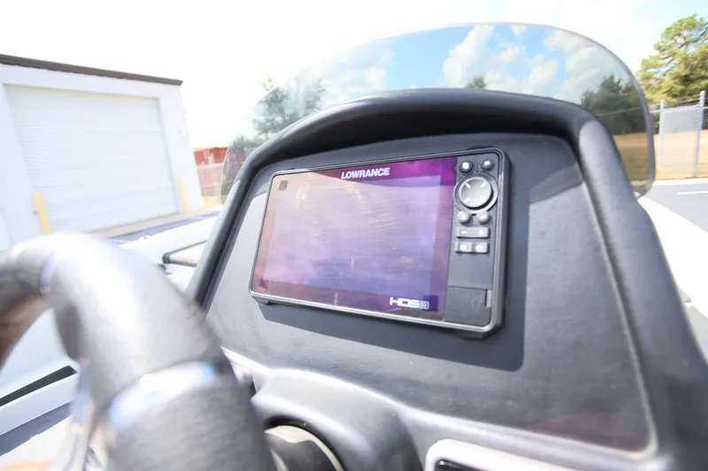 Slide: The Image of Dashboard of 2020 Caymas CX 20 PRO with Lowrance HDS display. - 11