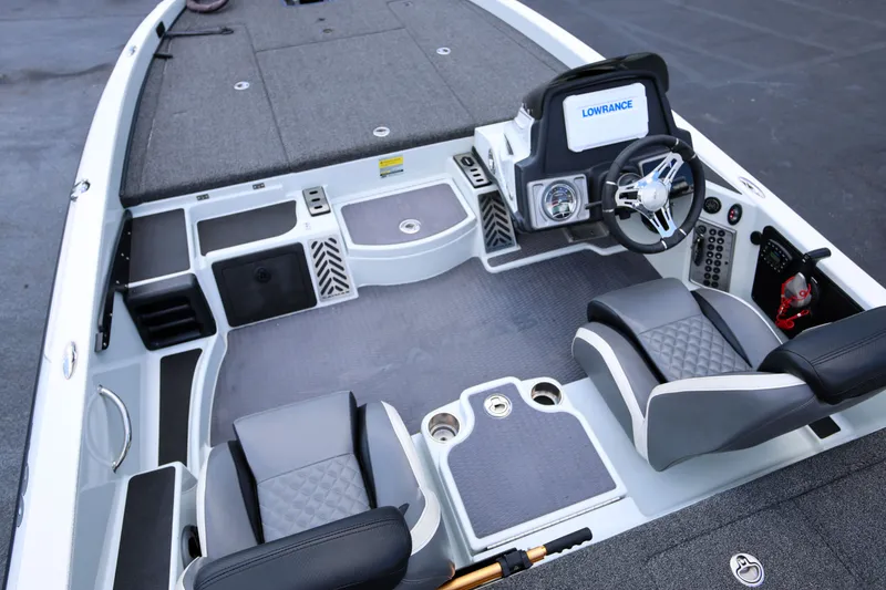 Slide: The Image of 2020 Caymas CX 20 PRO boat interior with steering wheel and seating. - 7