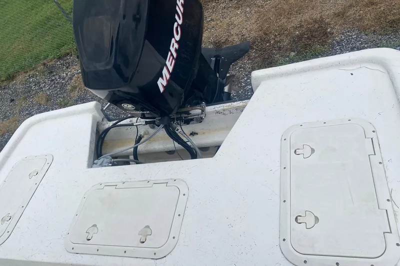 Slide: The Image of 2006 Mako 191 Inshore boat with Mercury outboard motor, viewed from above. - 4